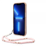 Guess iPhone 14 Pro Max Translucent -suojakuori, jossa hihna, pinkki