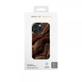 Ideal of Sweden iPhone 15 Pro -kuori Fashion Case MagSafe Dark Amber Marble