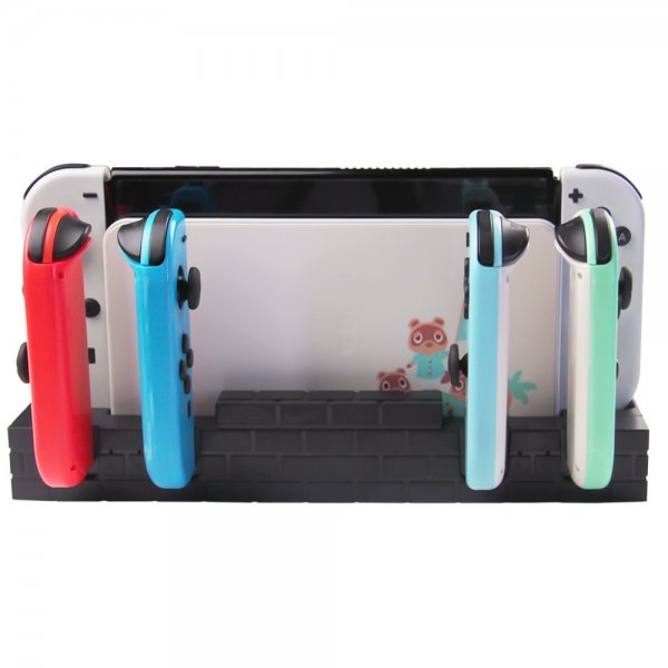 Nintendo Switch -lataustelakka Joy-Coneille ja pelisäilytyksellä, musta