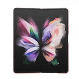 Guess Samsung Galaxy Z Fold 5 -kuori, jossa glitterhiutaleita ja metallinen logo, vaaleanpunainen